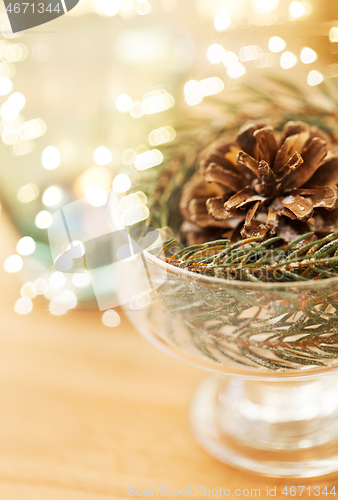 Image of close up of christmas decoration of fir and cone