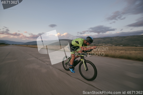 Image of triathlon athlete riding a bike