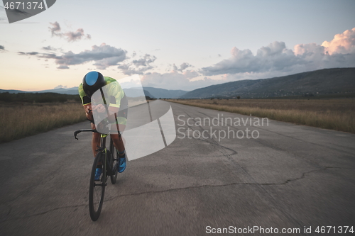 Image of triathlon athlete riding a bike