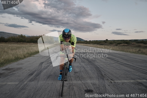 Image of triathlon athlete riding a bike