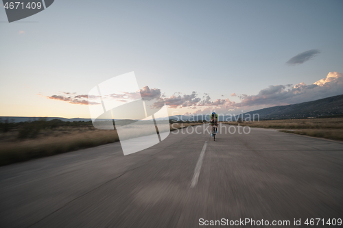 Image of triathlon athlete riding a bike