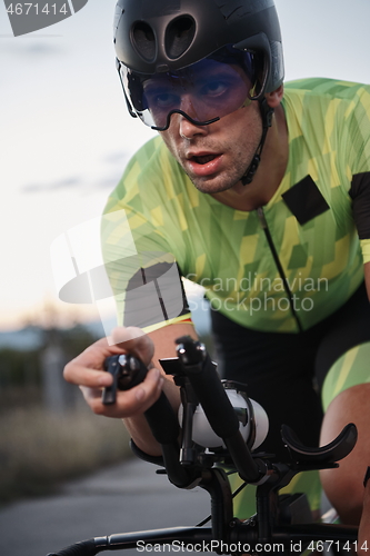 Image of triathlon athlete riding a bike