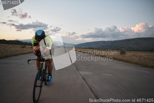 Image of triathlon athlete riding a bike