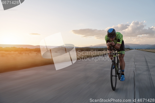 Image of triathlon athlete riding a bike