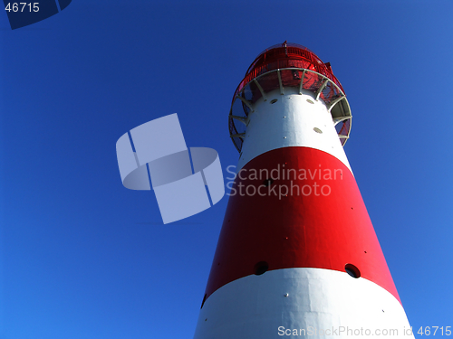 Image of red + white lighthouse