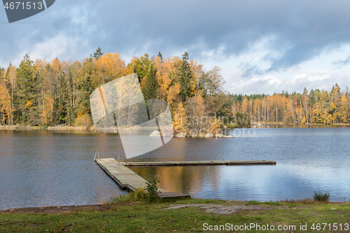 Image of Beautiful fall colors by a small lake