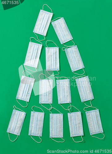 Image of Christmas tree made of medical face masks