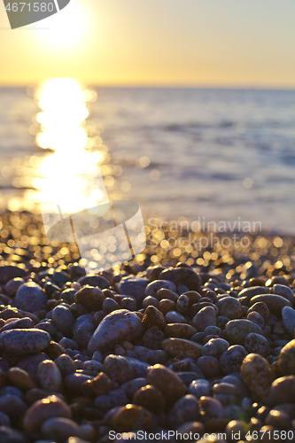 Image of Beautiful seascape, amazing view of pebble coastline.