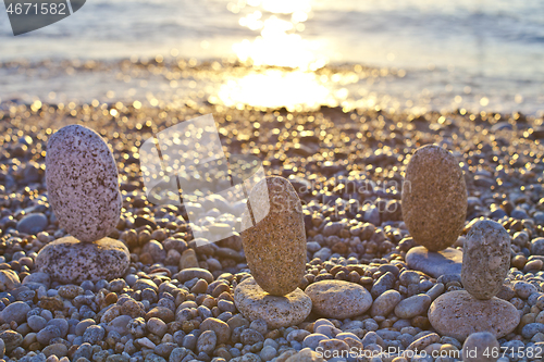 Image of Beautiful seascape, amazing view of pebble coastline in mild sun