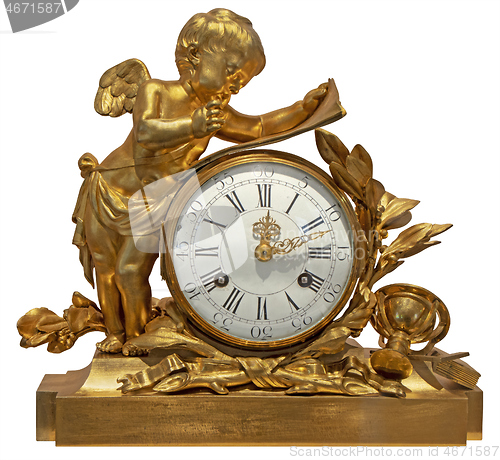 Image of Old vintage gilded table clock with an angel