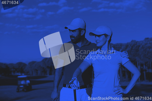 Image of portrait of couple on golf course