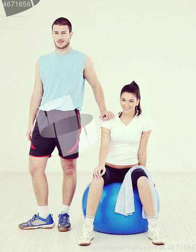 Image of happy young couple fitness workout and fun