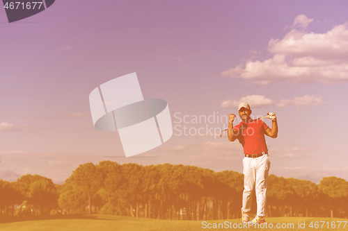 Image of golf player hitting long shot