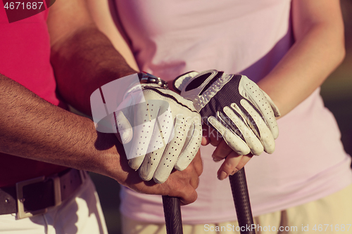 Image of portrait of couple on golf course