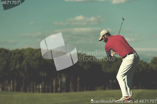 Image of golf player hitting long shot