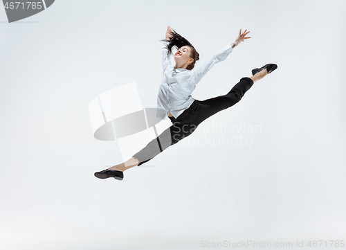 Image of Happy business woman dancing and smiling isolated on white.