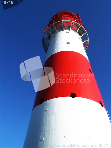 Image of red + white lighthouse
