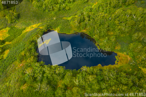 Image of Aerial top view of blue lake In north forest