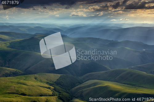 Image of Sunbeams on hills in Caucasus mountains