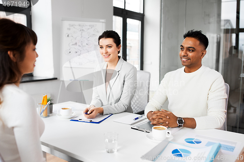 Image of recruiters having job interview with employee