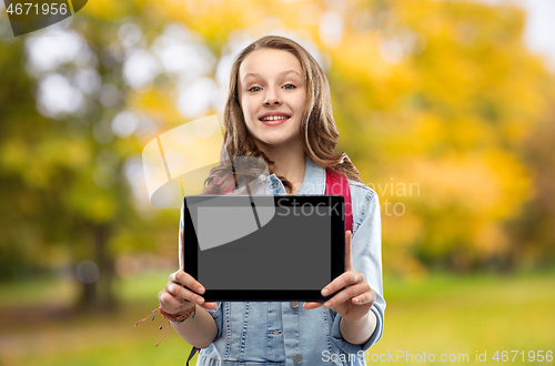 Image of student girl with school bag and tablet computer