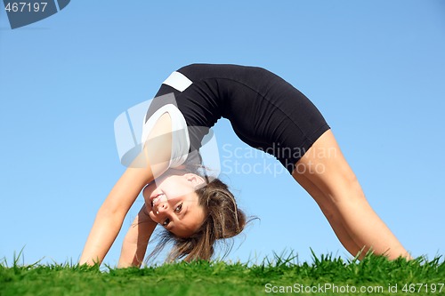 Image of Cute girl doing bridge