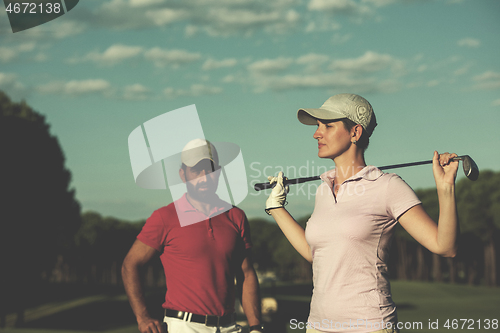 Image of portrait of couple on golf course