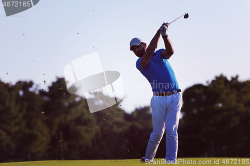 Image of golfer hitting long shot