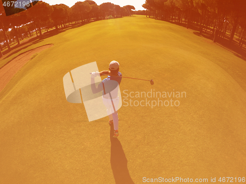 Image of top view of golf player hitting shot