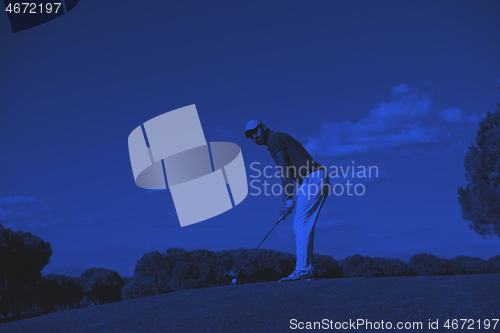 Image of golf player hitting long shot