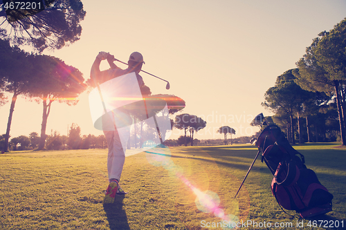 Image of golf player hitting long shot