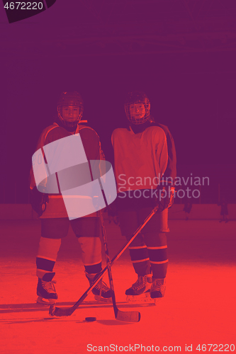 Image of teen girls ice hockey players portrait