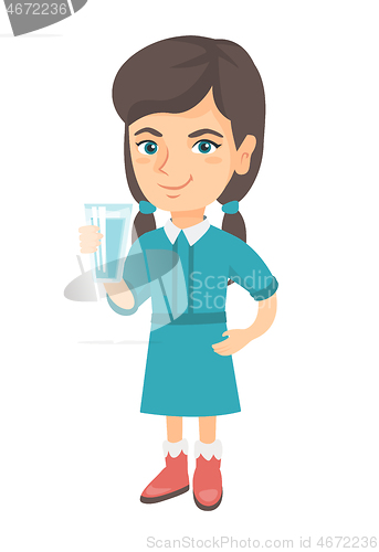 Image of Little caucasian girl holding a glass of water.