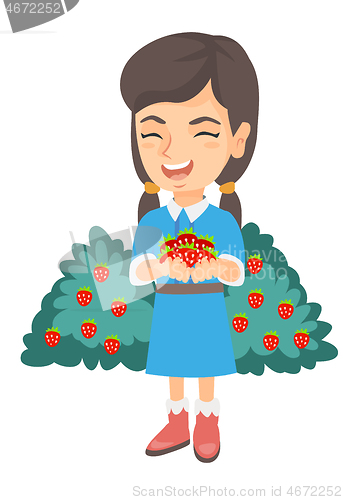 Image of Caucasian girl holding fresh strawberries in hands