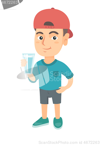 Image of Little caucasian boy holding a glass of water.
