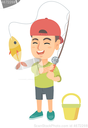 Image of Little boy holding fishing rod with fish on hook.