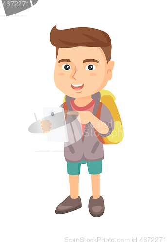 Image of Caucasian boy with backpack pointing at cellphone.