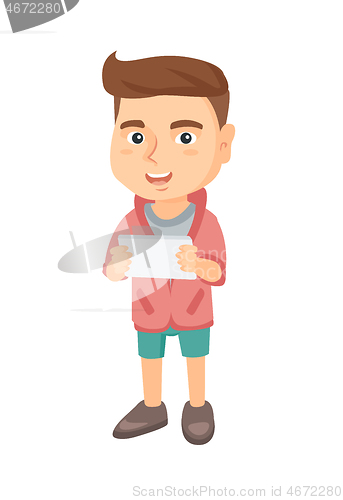 Image of Little caucasian boy using a tablet computer.
