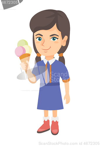 Image of Little caucasian girl holding an ice cream cone.