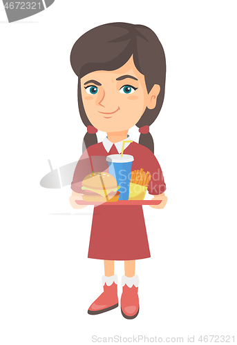 Image of Little caucasian girl holding tray with fast food.