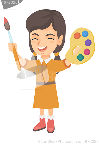 Image of Happy girl drawing with colorful paints and brush.