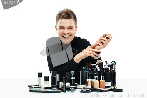 Image of Professional makeup artist isolated on white