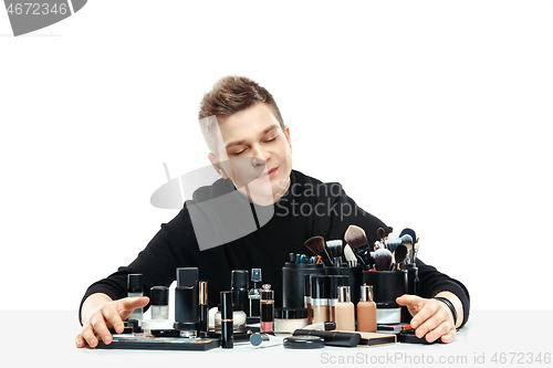 Image of Professional makeup artist isolated on white