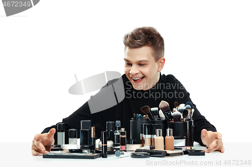 Image of Professional makeup artist isolated on white