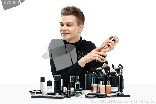 Image of Professional makeup artist isolated on white