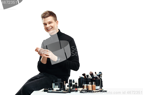 Image of Professional makeup artist isolated on white