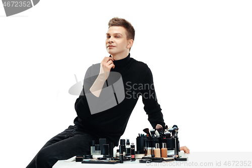 Image of Professional makeup artist isolated on white