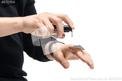 Image of Professional makeup artist working at salon