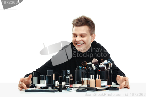 Image of Professional makeup artist isolated on white