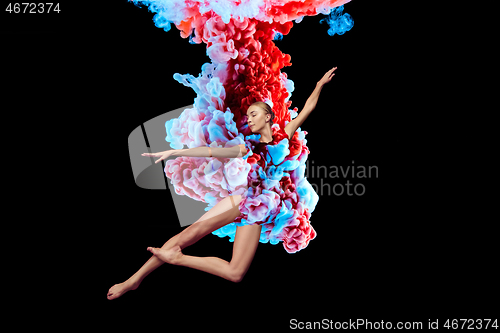 Image of Modern art collage. Concept ballerina\'s legs with colorful smoke.